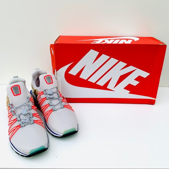 nike shox gravity metallic gold